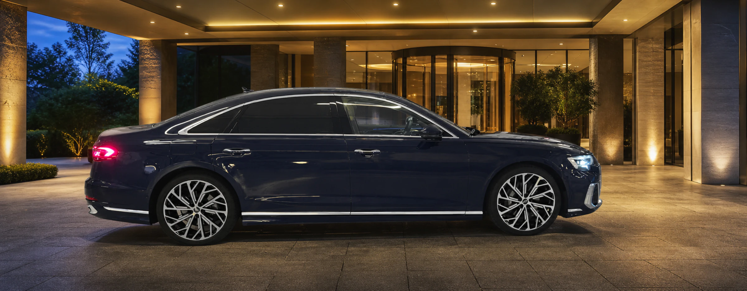 Blue New Fly Service executive flagship at a hotel entrance