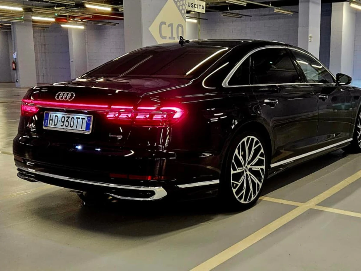 Rear three-quarter view of the executive flagship